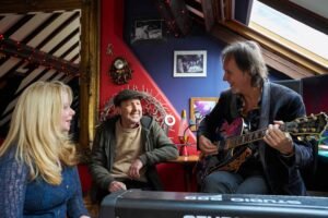 The three creators of the Rockford's Rock Opera musical adventure stories, in their studio at home.